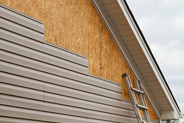 Professional Siding Installation technician working in Cocolamus, PA